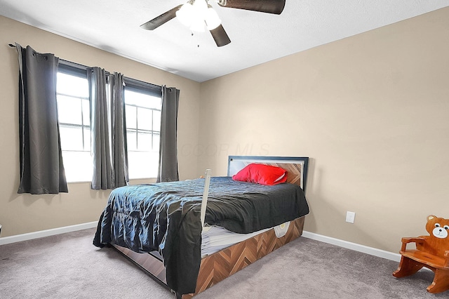 1598 Metcalfe Ave, Obetz, OH 43207 - bedroom with baseboards, carpet flooring, and ceiling fan