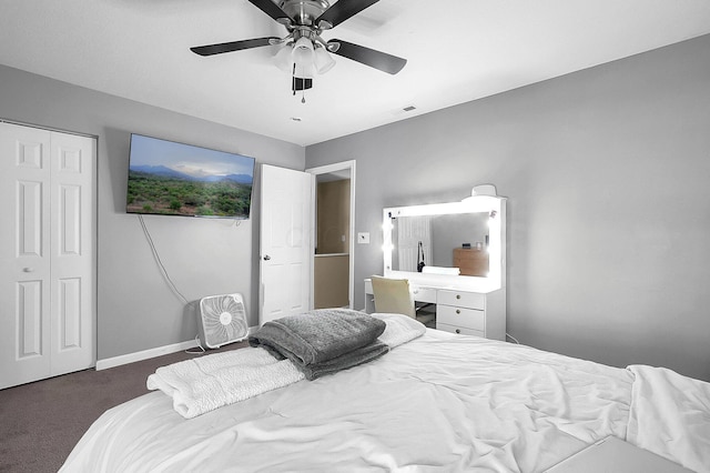 1598 Metcalfe Ave, Obetz, OH 43207 - carpeted bedroom with ceiling fan, a closet, and baseboards