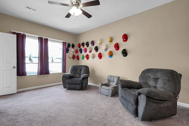 1598 Metcalfe Ave, Obetz, OH 43207 - living area with carpet floors, ceiling fan, and baseboards
