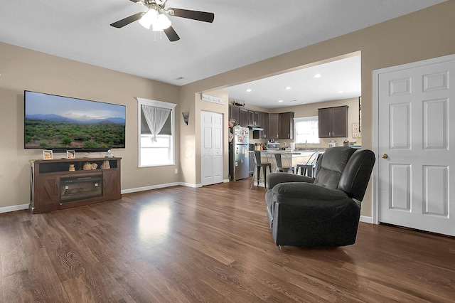 1598 Metcalfe Ave, Obetz, OH 43207 - living room with dark wood-style floors, a ceiling fan, baseboards, and recessed lighting
