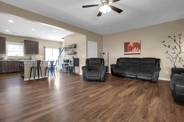 1598 Metcalfe Ave, Obetz, OH 43207 - living area featuring dark wood-style flooring, a ceiling fan, recessed lighting, and baseboards