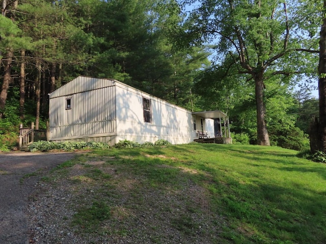 1210 Bronx Corner Rd, Ray, OH 45672 - view of home's exterior featuring a lawn