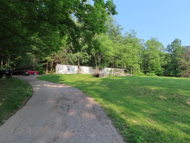 1210 Bronx Corner Rd, Ray, OH 45672 - view of grassy yard featuring a wooded view