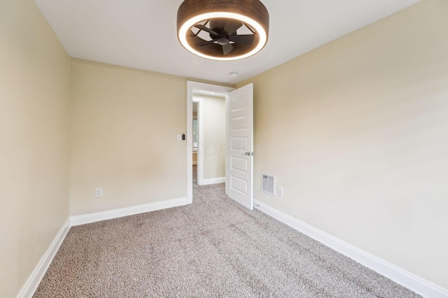 943 S Champion Ave, Columbus, OH 43206 - carpeted spare room with baseboards and a ceiling fan