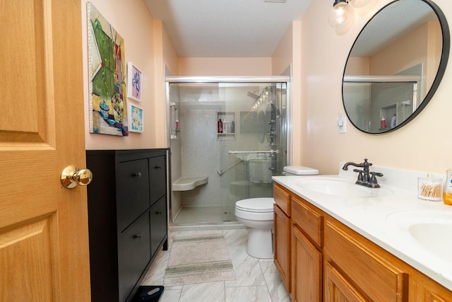 91 Richard Ave, South Bloomfield, OH 43103 - full bath featuring double vanity, a shower stall, toilet, and marble finish flooring