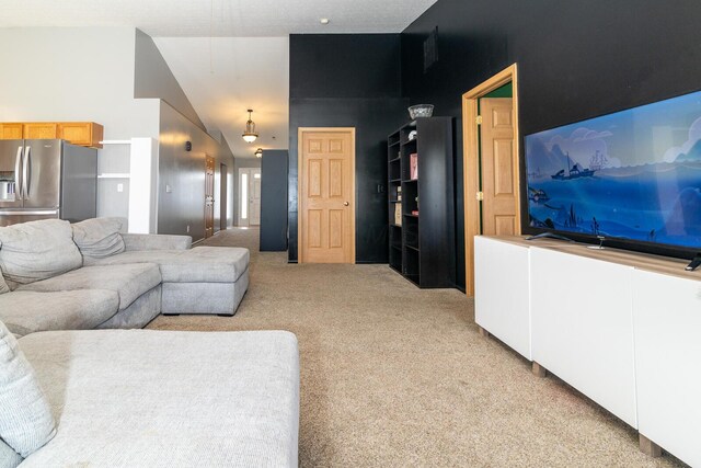 91 Richard Ave, South Bloomfield, OH 43103 - living room featuring carpet flooring and lofted ceiling