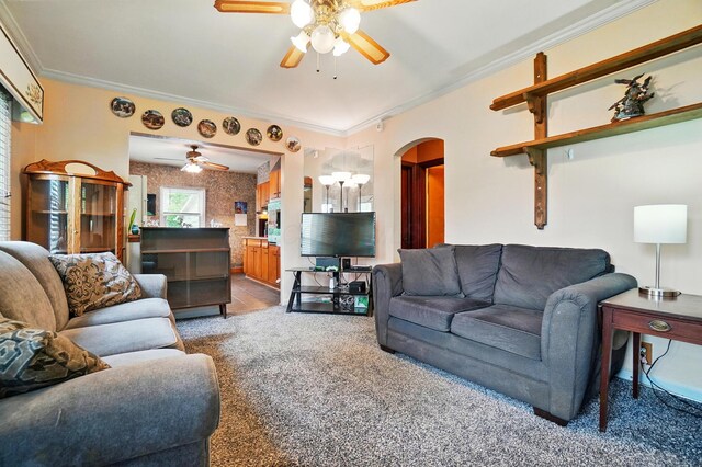 2506 Chester Rd, Columbus, OH 43231 - carpeted living area with ceiling fan, arched walkways, and crown molding