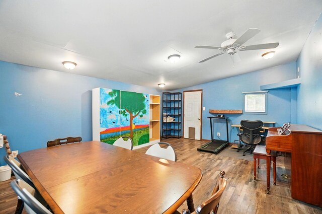 2506 Chester Rd, Columbus, OH 43231 - dining room with wood finished floors, a desk, ceiling fan, and lofted ceiling