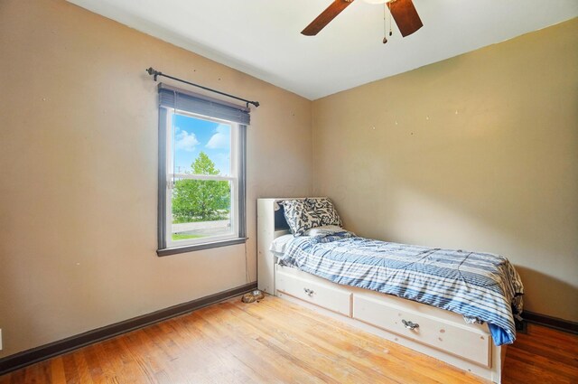 2506 Chester Rd, Columbus, OH 43231 - bedroom featuring wood finished floors, baseboards, and ceiling fan