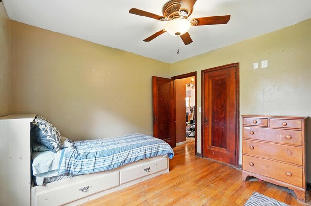 2506 Chester Rd, Columbus, OH 43231 - bedroom with light wood-style floors and ceiling fan