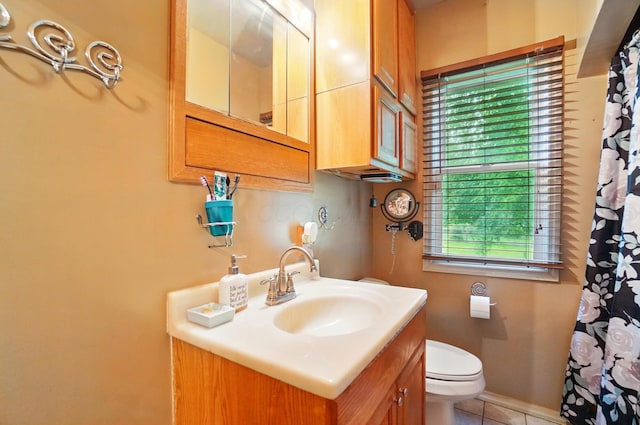 2506 Chester Rd, Columbus, OH 43231 - full bathroom featuring toilet, vanity, tile patterned floors, and curtained shower
