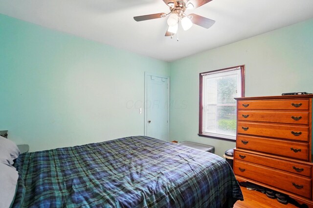 2506 Chester Rd, Columbus, OH 43231 - bedroom featuring wood finished floors and a ceiling fan