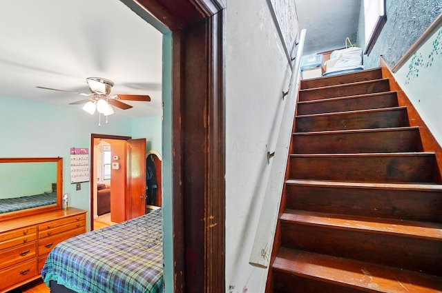 2506 Chester Rd, Columbus, OH 43231 - stairs featuring a ceiling fan