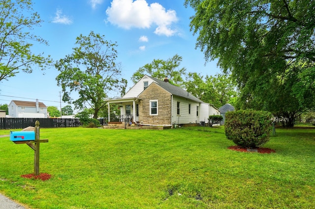 2506 Chester Rd, Columbus, OH 43231 - view of front facade featuring a chimney and covered porch