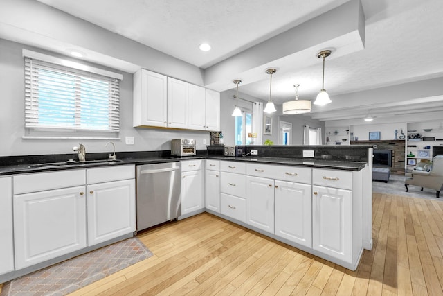 563 Wickham Way, Gahanna, OH 43230 - kitchen with dishwasher, a peninsula, plenty of natural light, white cabinets, and recessed lighting