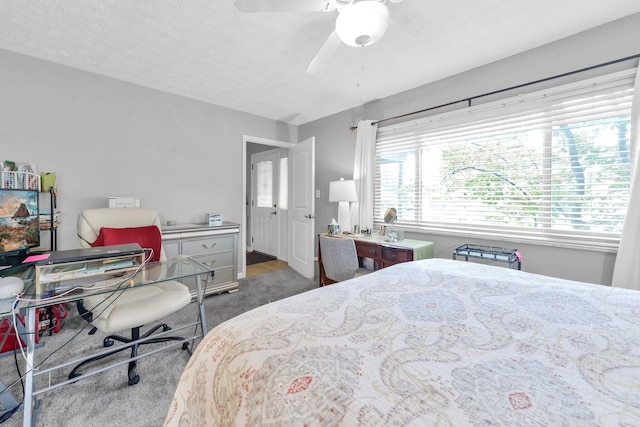 563 Wickham Way, Gahanna, OH 43230 - carpeted bedroom with an office area and a ceiling fan