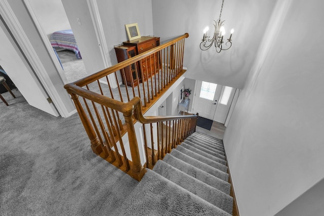 563 Wickham Way, Gahanna, OH 43230 - stairs with carpet flooring and a chandelier