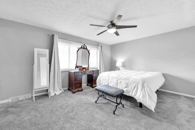 563 Wickham Way, Gahanna, OH 43230 - carpeted bedroom with a ceiling fan and a textured ceiling