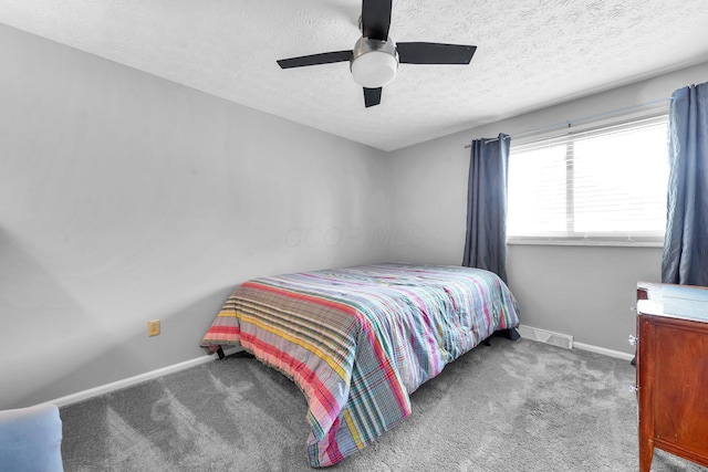 563 Wickham Way, Gahanna, OH 43230 - carpeted bedroom with a textured ceiling and ceiling fan