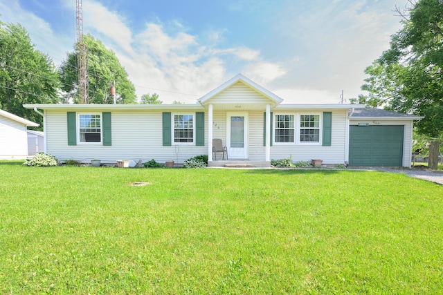 126 Holly Ln, Russells Point, OH 43348 - ranch-style home featuring asphalt driveway, an attached garage, and a front yard