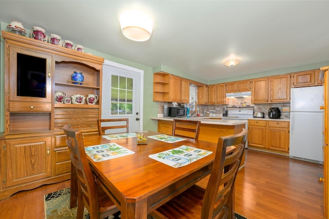 126 Holly Ln, Russells Point, OH 43348 - dining area featuring light wood finished floors