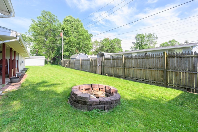 126 Holly Ln, Russells Point, OH 43348 - view of yard with an outdoor fire pit