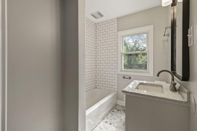 2592 Grasmere Ave, Columbus, OH 43211 - bathroom with vanity, tub / shower combination, and baseboards