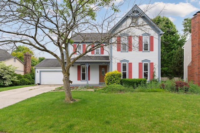 7552 Deer Creek Dr, Columbus, OH 43085 - view of front facade with driveway, a front lawn, a garage, and covered porch