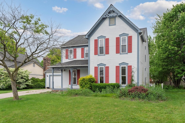 7552 Deer Creek Dr, Columbus, OH 43085 - view of front facade with a front yard, driveway, and roof with shingles