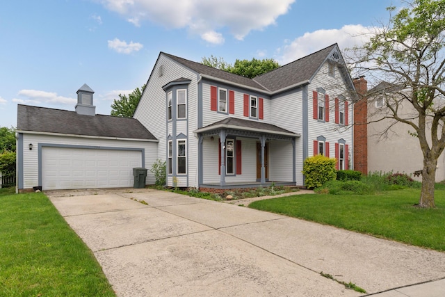 7552 Deer Creek Dr, Columbus, OH 43085 - victorian home featuring covered porch, a front yard, driveway, and a garage
