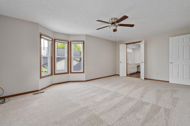 7552 Deer Creek Dr, Columbus, OH 43085 - unfurnished bedroom featuring carpet flooring, baseboards, and a ceiling fan