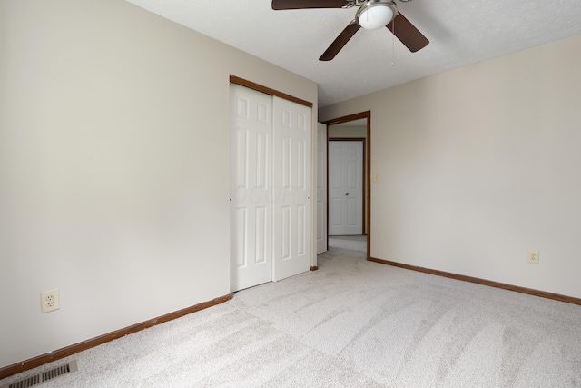 7552 Deer Creek Dr, Columbus, OH 43085 - unfurnished bedroom featuring carpet, a closet, baseboards, and ceiling fan