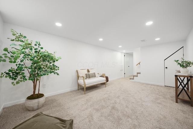 1079 Loring Rd, Columbus, OH 43224 - living area featuring stairs, recessed lighting, carpet floors, and baseboards