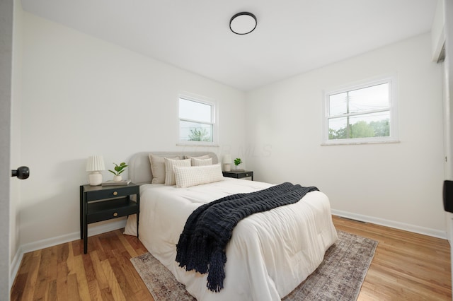 1079 Loring Rd, Columbus, OH 43224 - bedroom featuring light wood finished floors and baseboards