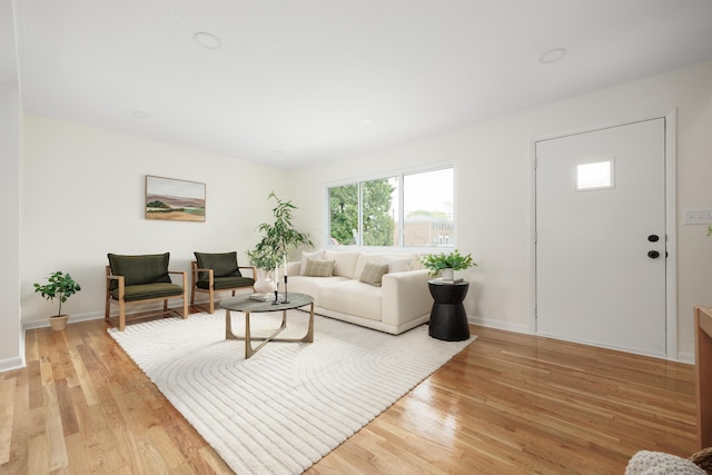 1079 Loring Rd, Columbus, OH 43224 - living area with light wood finished floors and baseboards