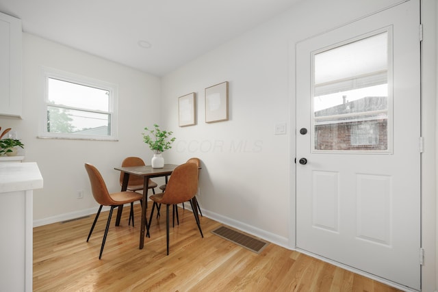 1079 Loring Rd, Columbus, OH 43224 - dining space featuring light wood-type flooring and baseboards
