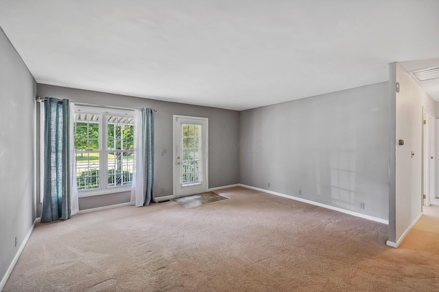 929 Fairwood Ave, Marion, OH 43302 - carpeted empty room with baseboards and attic access