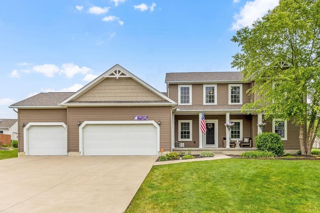 405 Tyler Station Dr, Johnstown, OH 43031 - view of front of house with an attached garage, driveway, a front yard, and a porch