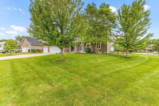 405 Tyler Station Dr, Johnstown, OH 43031 - obstructed view of property featuring driveway, a front yard, a porch, and an attached garage