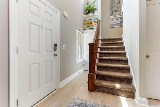 405 Tyler Station Dr, Johnstown, OH 43031 - entrance foyer featuring light wood finished floors, stairs, and baseboards