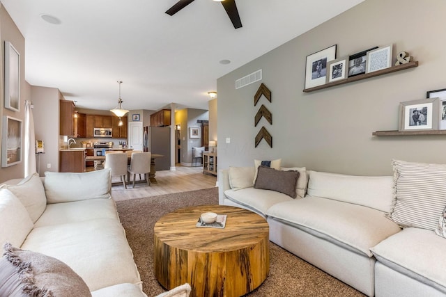 405 Tyler Station Dr, Johnstown, OH 43031 - living room featuring a ceiling fan and light wood-style floors