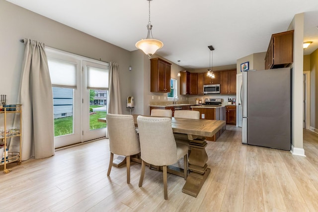 405 Tyler Station Dr, Johnstown, OH 43031 - dining space with light wood-style flooring