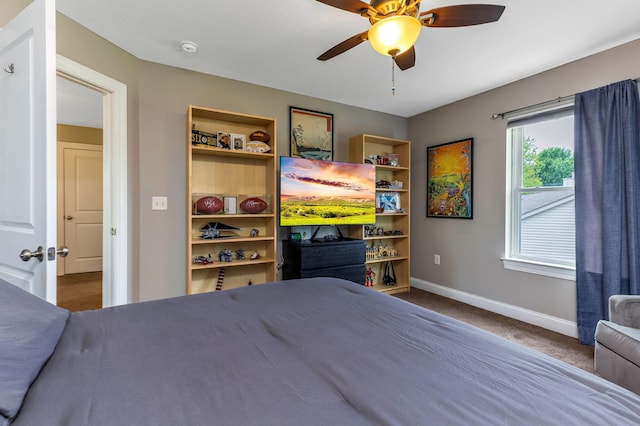405 Tyler Station Dr, Johnstown, OH 43031 - carpeted bedroom with baseboards and a ceiling fan