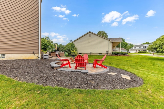 405 Tyler Station Dr, Johnstown, OH 43031 - view of green lawn featuring a patio area and a fire pit