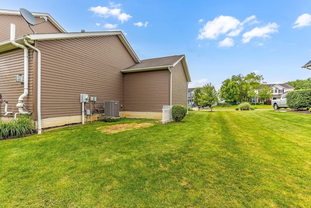 405 Tyler Station Dr, Johnstown, OH 43031 - view of side of home with cooling unit and a lawn