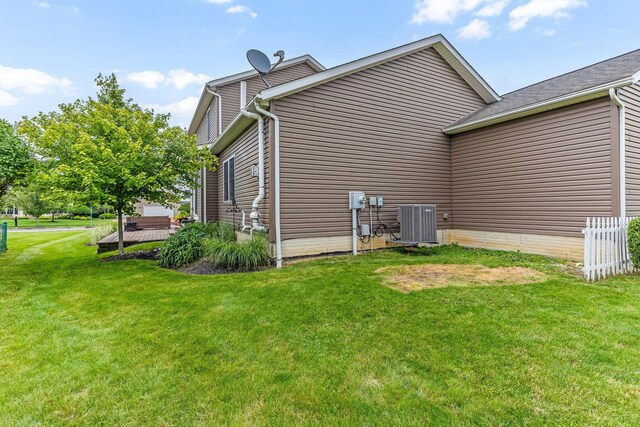 405 Tyler Station Dr, Johnstown, OH 43031 - view of home's exterior with central air condition unit and a lawn