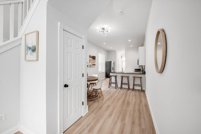 1116 Summit St Unit 1114, Columbus, OH 43201 - hall with light wood-type flooring, baseboards, and recessed lighting