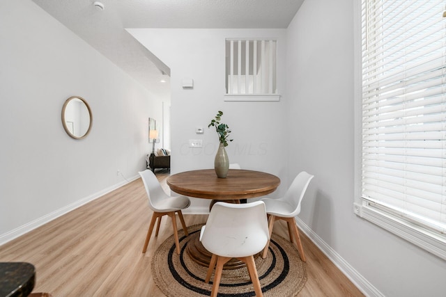 1116 Summit St Unit 1114, Columbus, OH 43201 - dining area featuring light wood-type flooring and baseboards