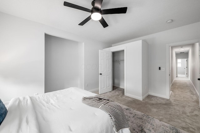 1116 Summit St Unit 1114, Columbus, OH 43201 - bedroom featuring light colored carpet, baseboards, and a ceiling fan