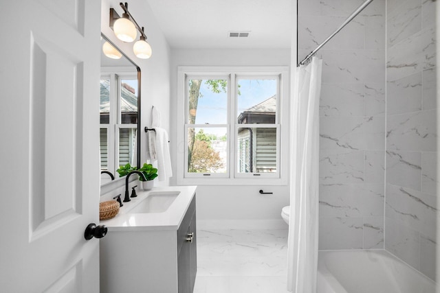 1116 Summit St Unit 1114, Columbus, OH 43201 - full bath with marble finish floors, vanity, shower / bath combo, and toilet